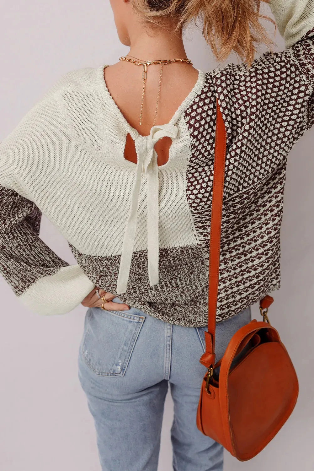 Dark Khaki women's loose sweater with colour block design and back tie detail.