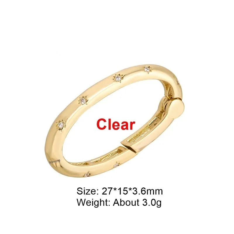 Copper climbing heart button fastener with micro-inlaid zircon stones and gold electroplating.