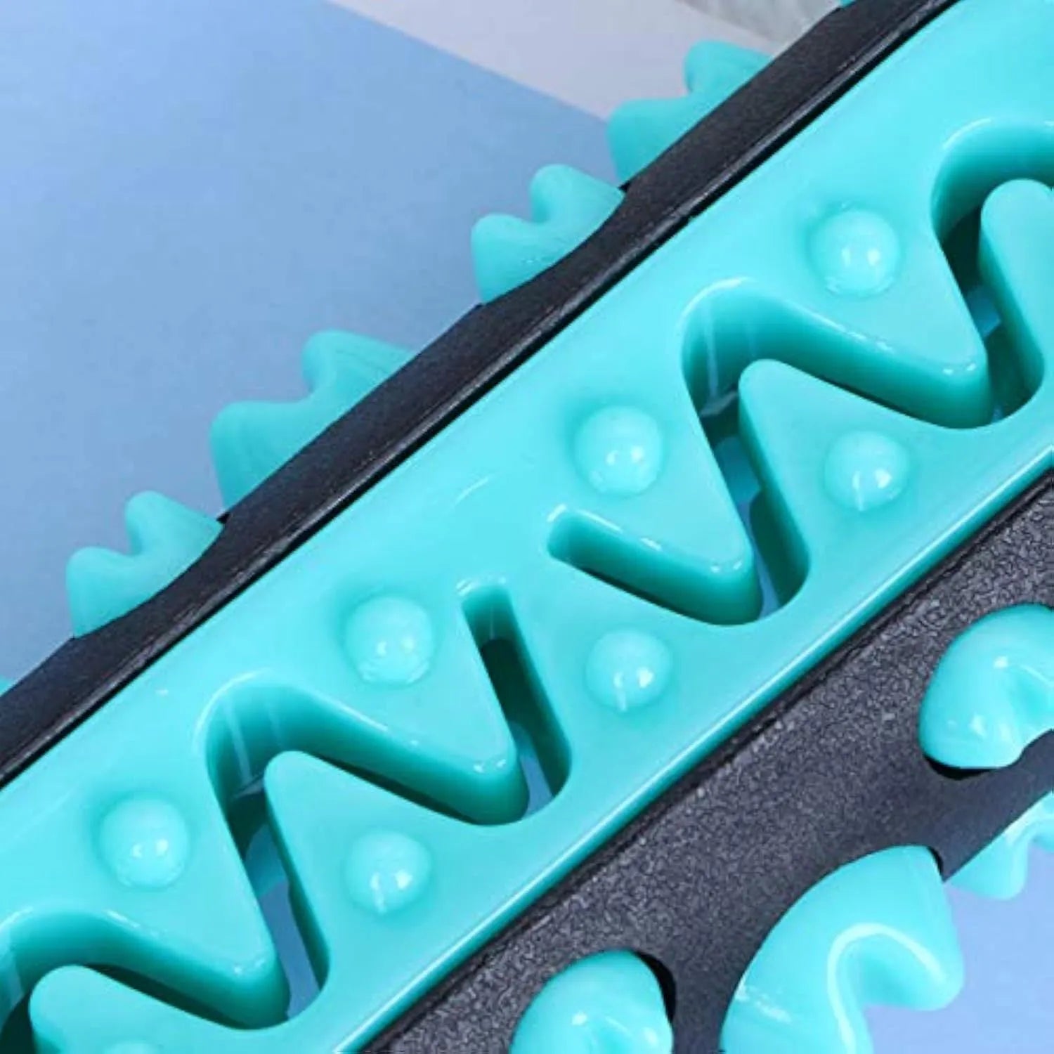 Natural rubber dog dental chew toy with textured toothbrush surface in blue colour
