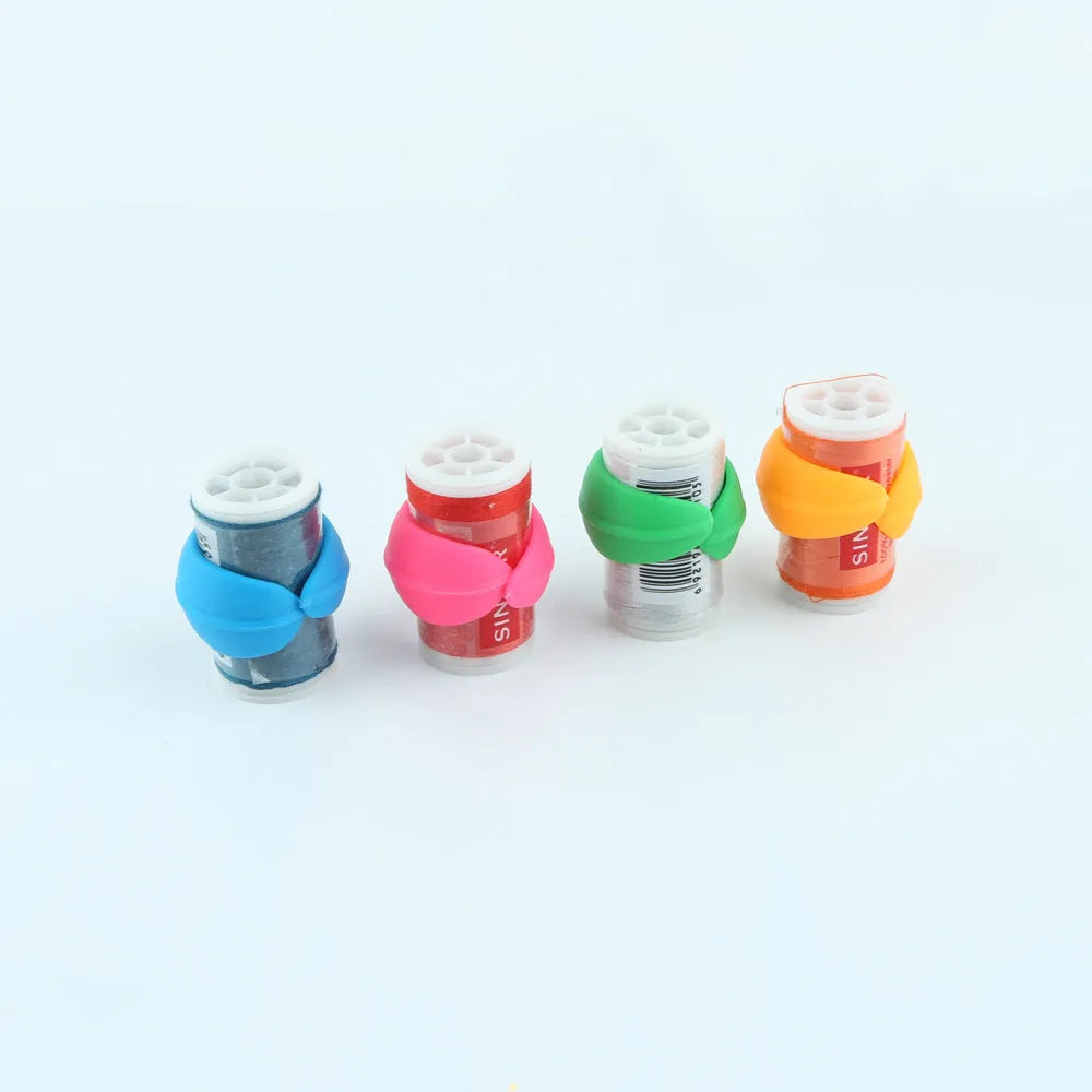 Set of 14 silicone sewing spool fixing clips in 20mm size in circle blue, green, orange, and pink