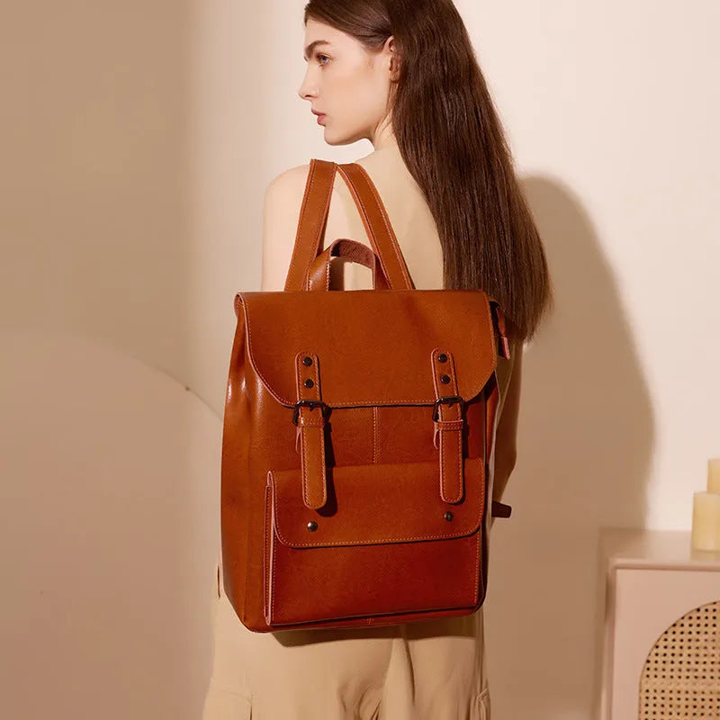 Women's leather computer backpack in black made from two-layer cowhide with hard structure