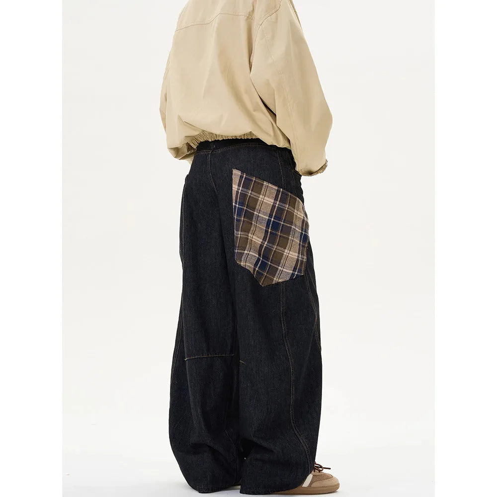 Loose fit straight-leg cotton trousers in a red plaid pattern, shown on a mid-waist.