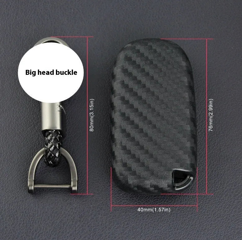 Black silicone protective case covering a Dodge car key fob, shown next to an unbuckled version.