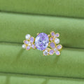 Women's copper open ring with flower design and zircon stones in light purple or yellow