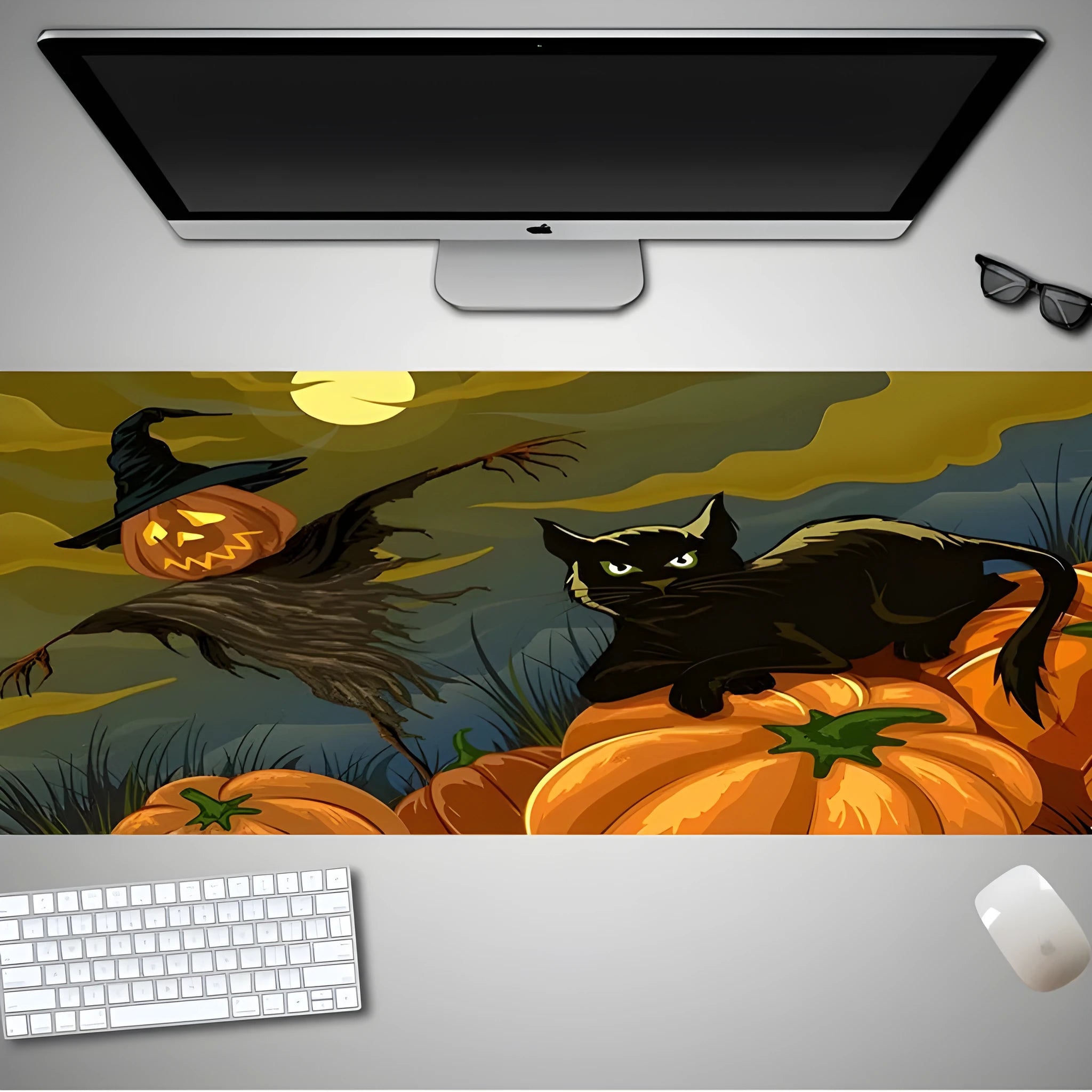 Large Halloween-themed rubber cloth mouse pad on a desk, showing non-slip backing and graphic design.