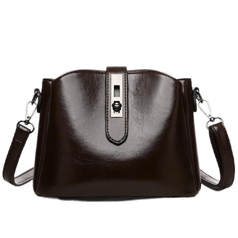 Women's retro fashion messenger bag in PU with sandwich pocket, available in black, brown, and white