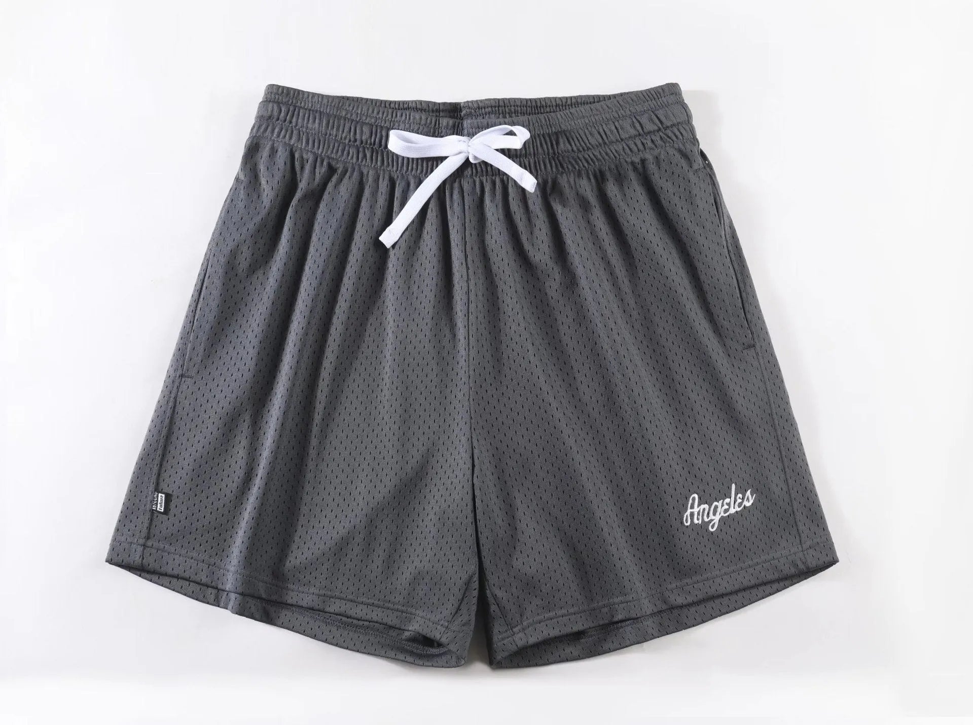 Men's double-layer mesh shorts in sports purple, showing the breathable fabric and casual fit.