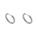 Geometric women's ear clip with round eyelet in gold or silver plating.