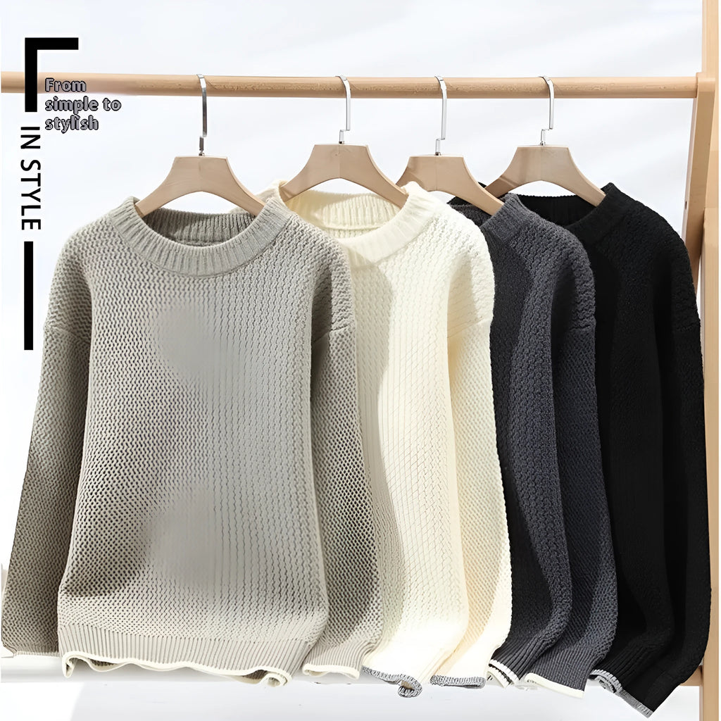 A grey men's loose round-neck pullover sweater with long sleeves on a hanger.
