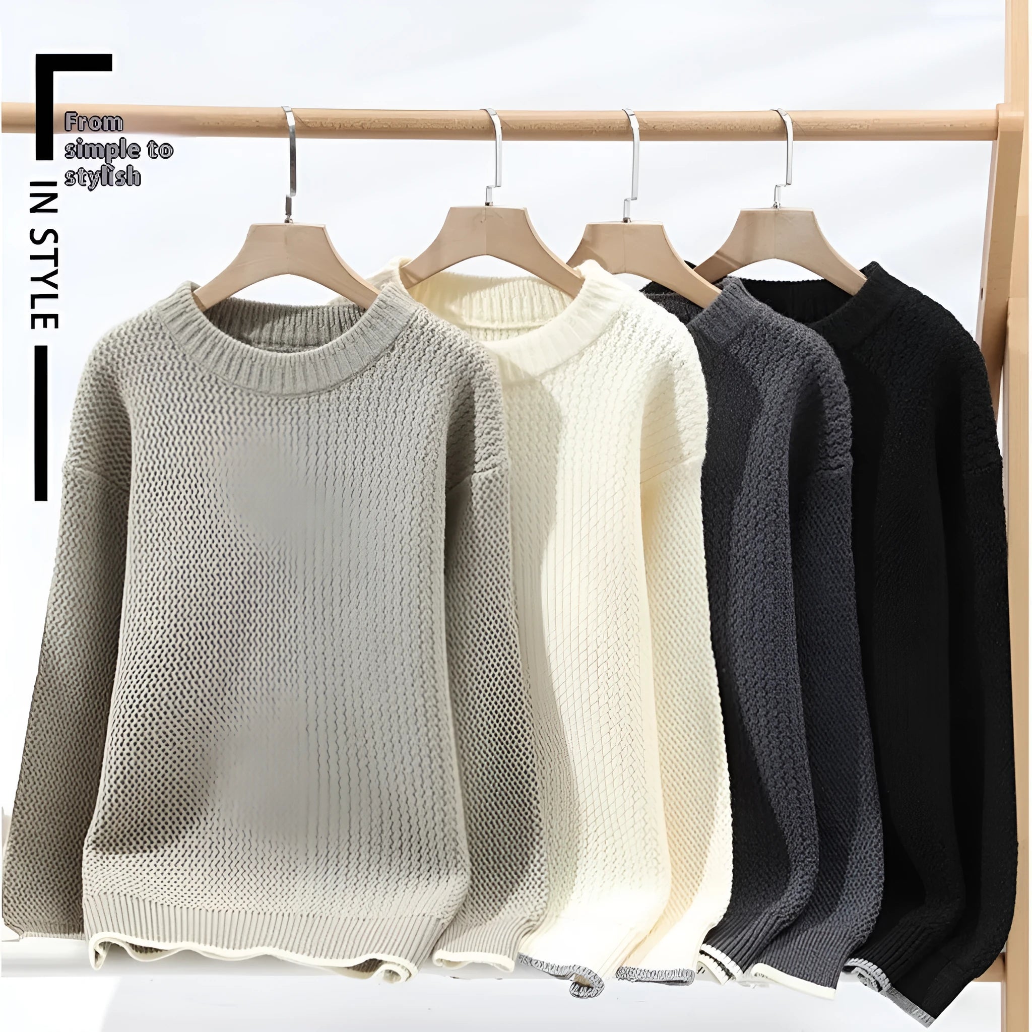 A grey men's loose round-neck pullover sweater with long sleeves on a hanger.