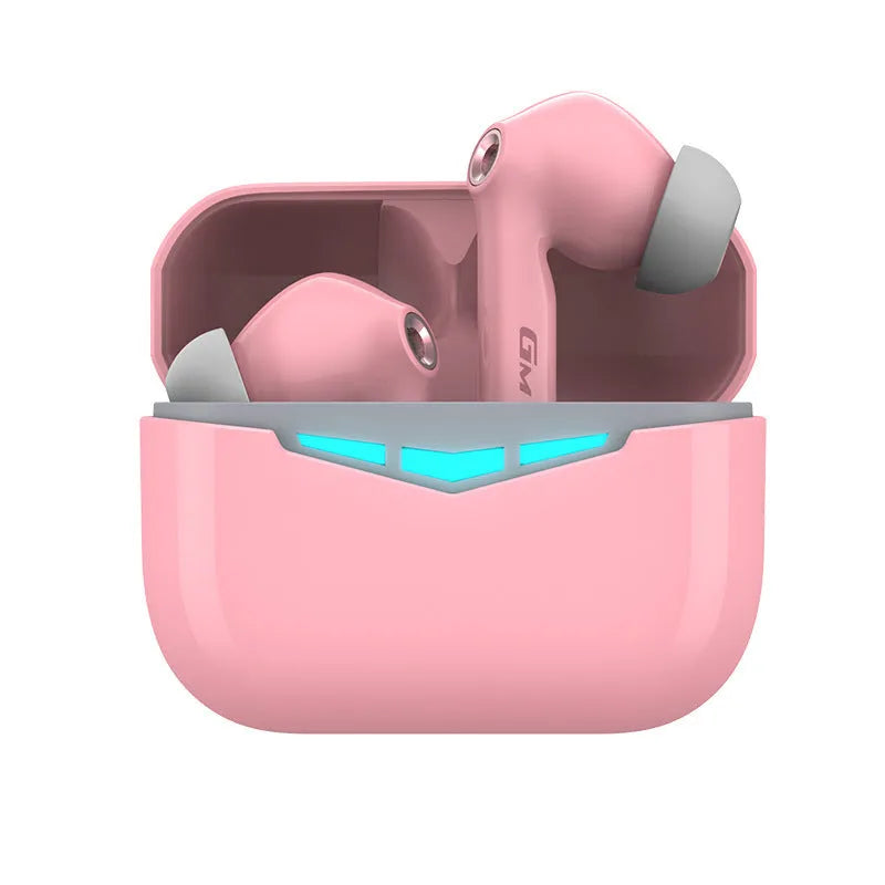 True wireless gaming earbuds in charging case, with spare silicone earmuffs, on a grey background.