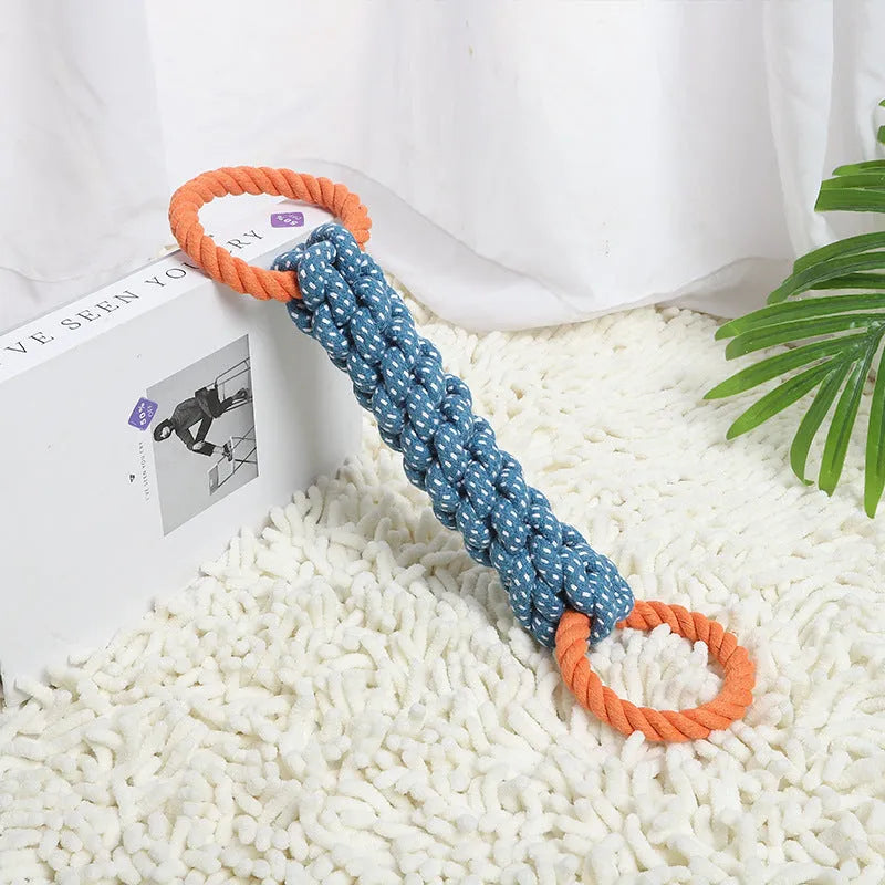 Blue braided cotton rope bone dog toy with double rings at each end for chewing and tooth cleaning