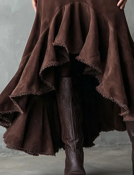 Brown high-low ruffle maxi skirt on hanger showing asymmetric hemline