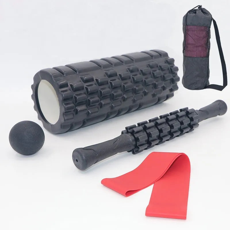 Black 33cm gear-textured foam massage roller on a white background.