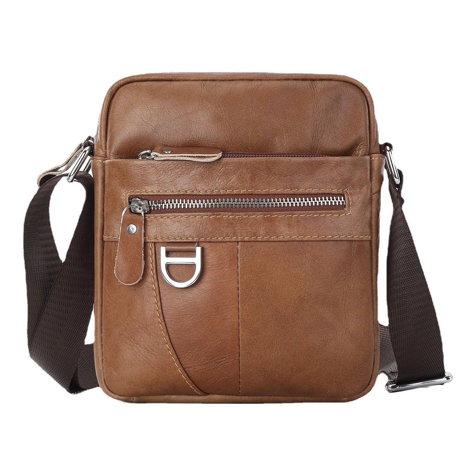 Retro brown leather messenger bag with crossbody strap on a table.