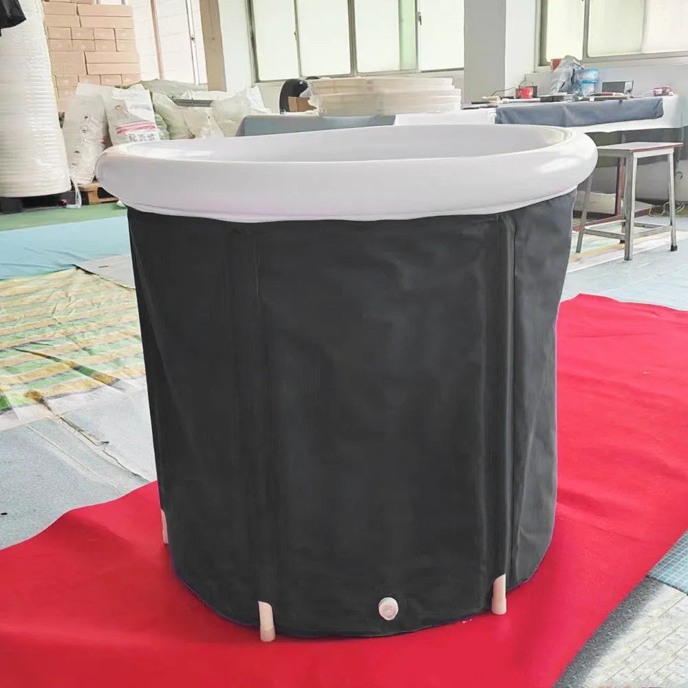 Black portable inflatable ice bath measuring 70x80cm with weather lid and accessories