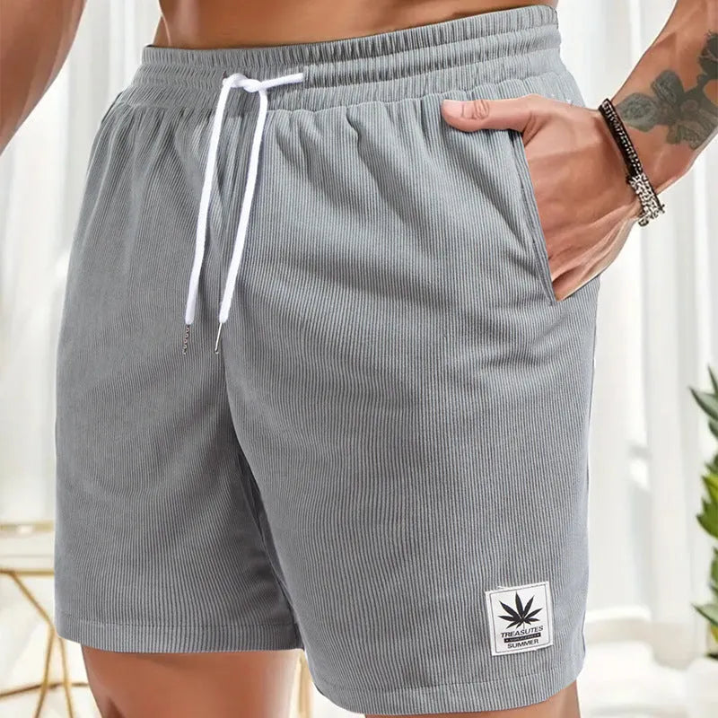 Man's pair of grey straight-leg summer shorts with a drawstring elastic waistband.