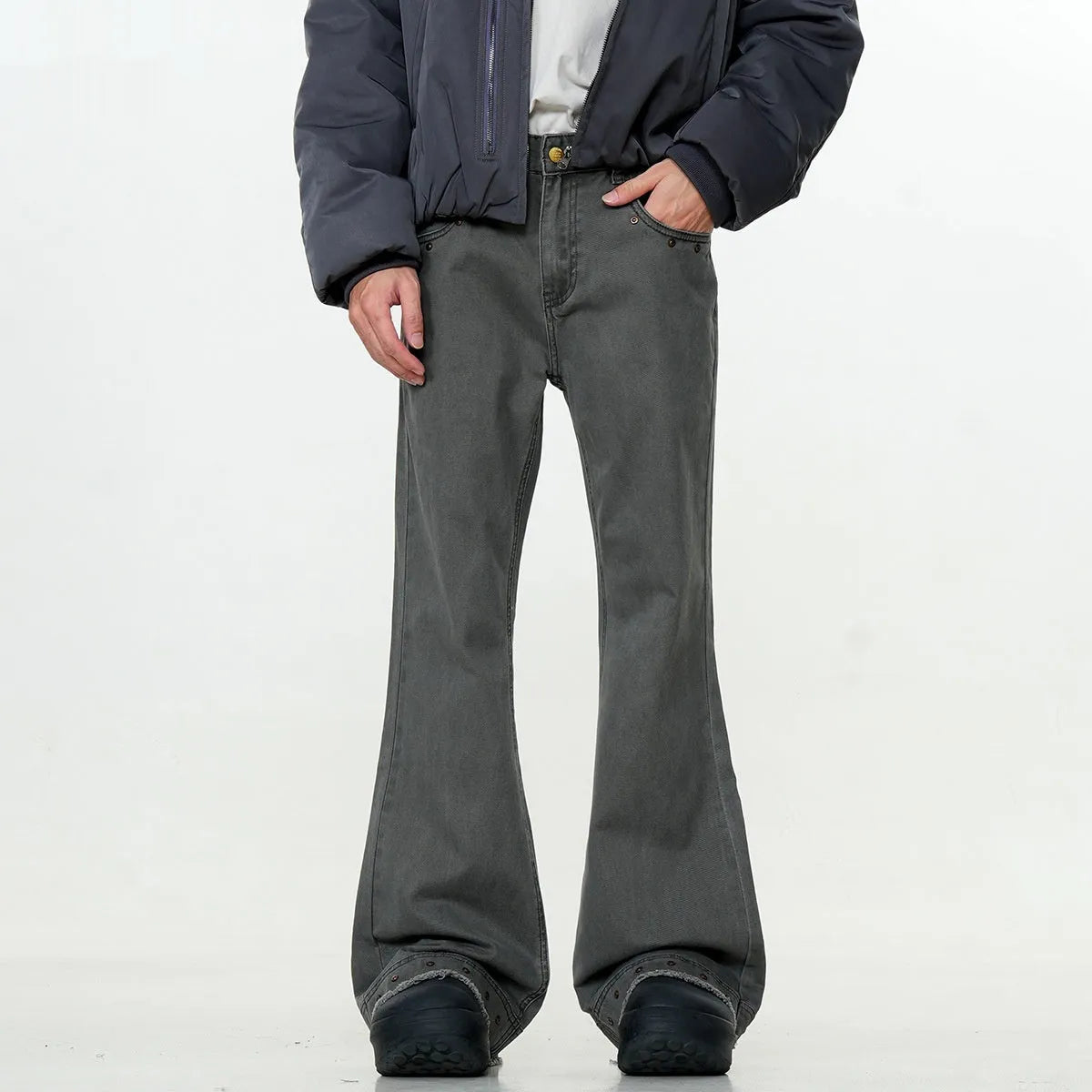 American retro straight-leg skinny jeans in black cotton denim laid flat.
