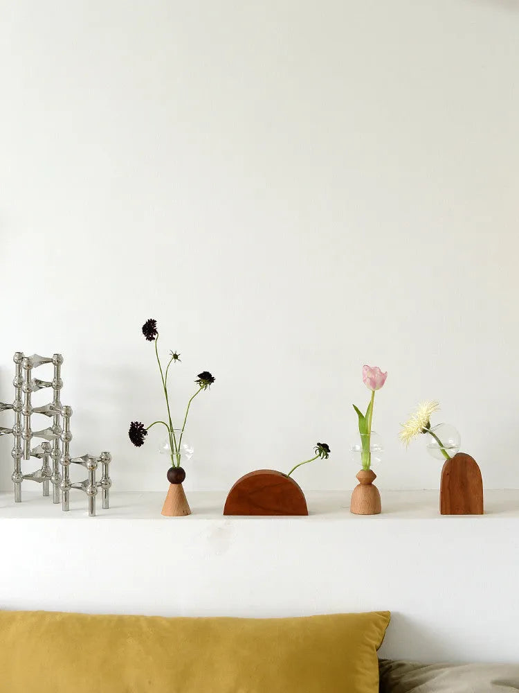 Nordic geometric bubble glass vase with wooden base showing conical and arc bottom designs