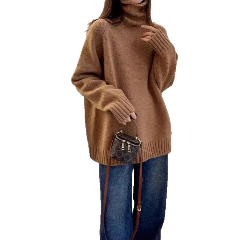 Women's loose fit turtleneck sweater with a thick, textured curling pile collar in a solid colour.