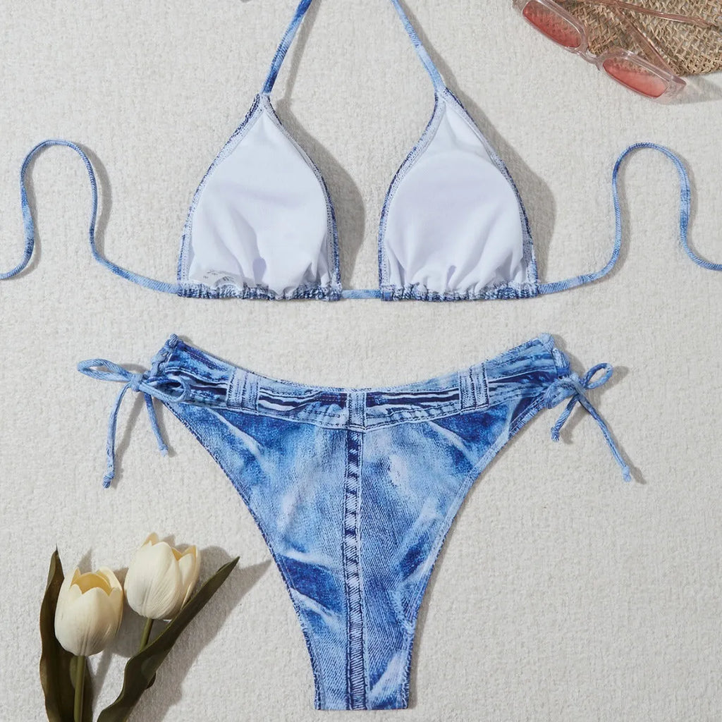Denim blue printed bikini top and bottom set for women on a mannequin.