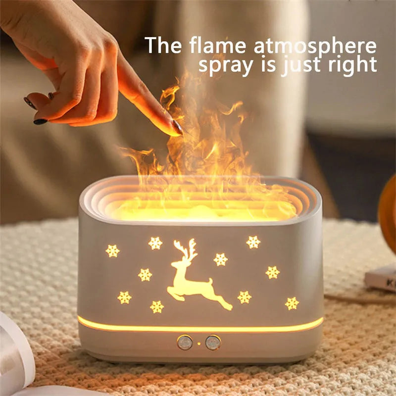 White round Elk flame effect humidifier diffuser with night light on a table.