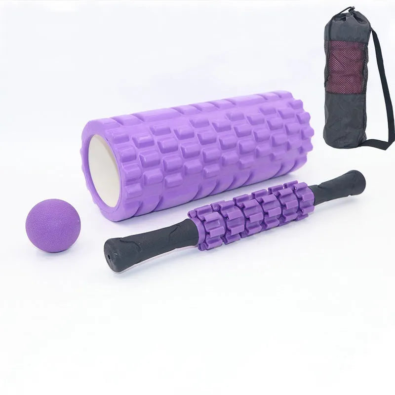 Black 33cm gear-textured foam massage roller on a white background.