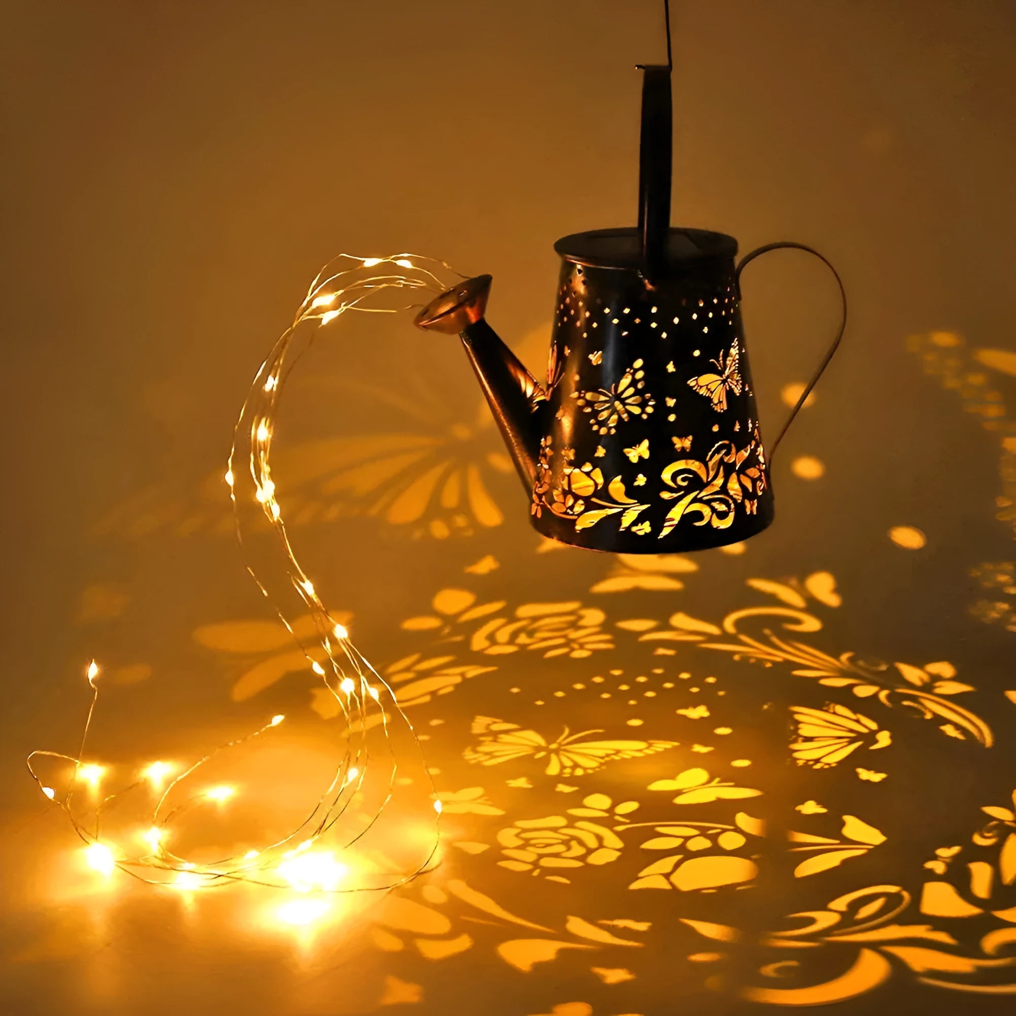 Solar garden lamp with iron butterfly design and warm white LED light for outdoor use.