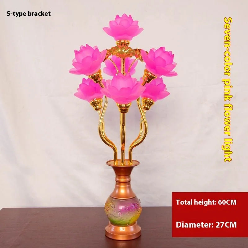 Coloured glaze pink and yellow LED lotus lantern for Buddha worship on an alloy stand.