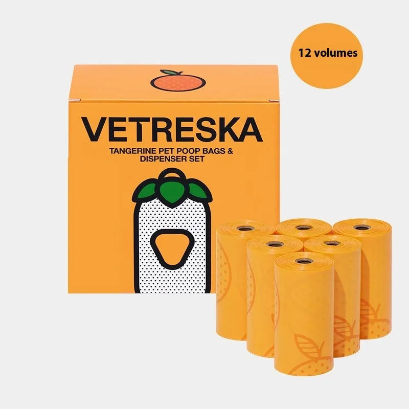 Colourful dog poo bag dispenser capsule with a roll of scented, biodegradable waste bags for dog walks