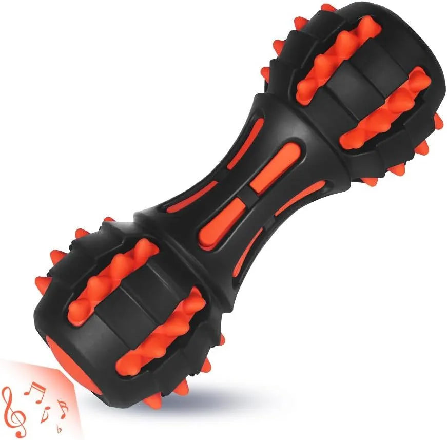Red dumbbell-shaped dog chew toy made of durable natural rubber with a squeaker inside.
