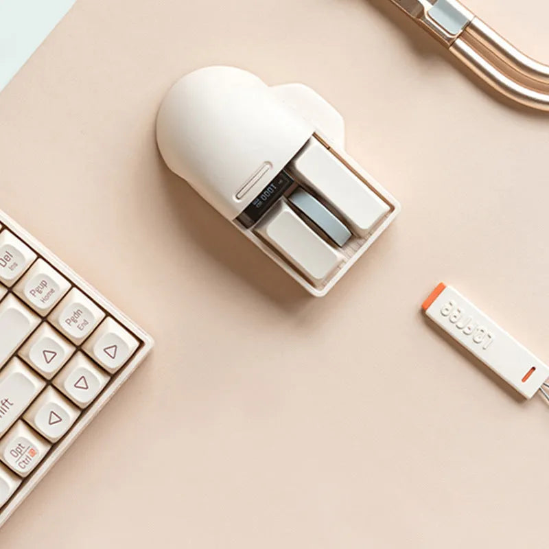 Xiaoqiao wireless mouse in tofu colour showing seven-button layout and Type-C charging port.