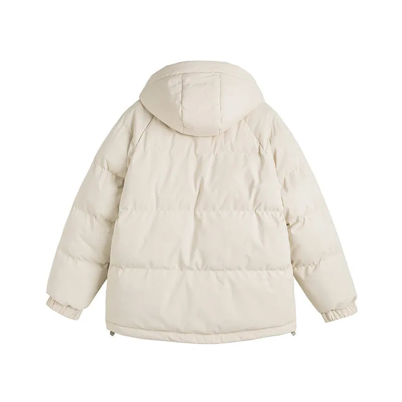 Loose-fit solid colour winter jacket with side pockets shown in beige