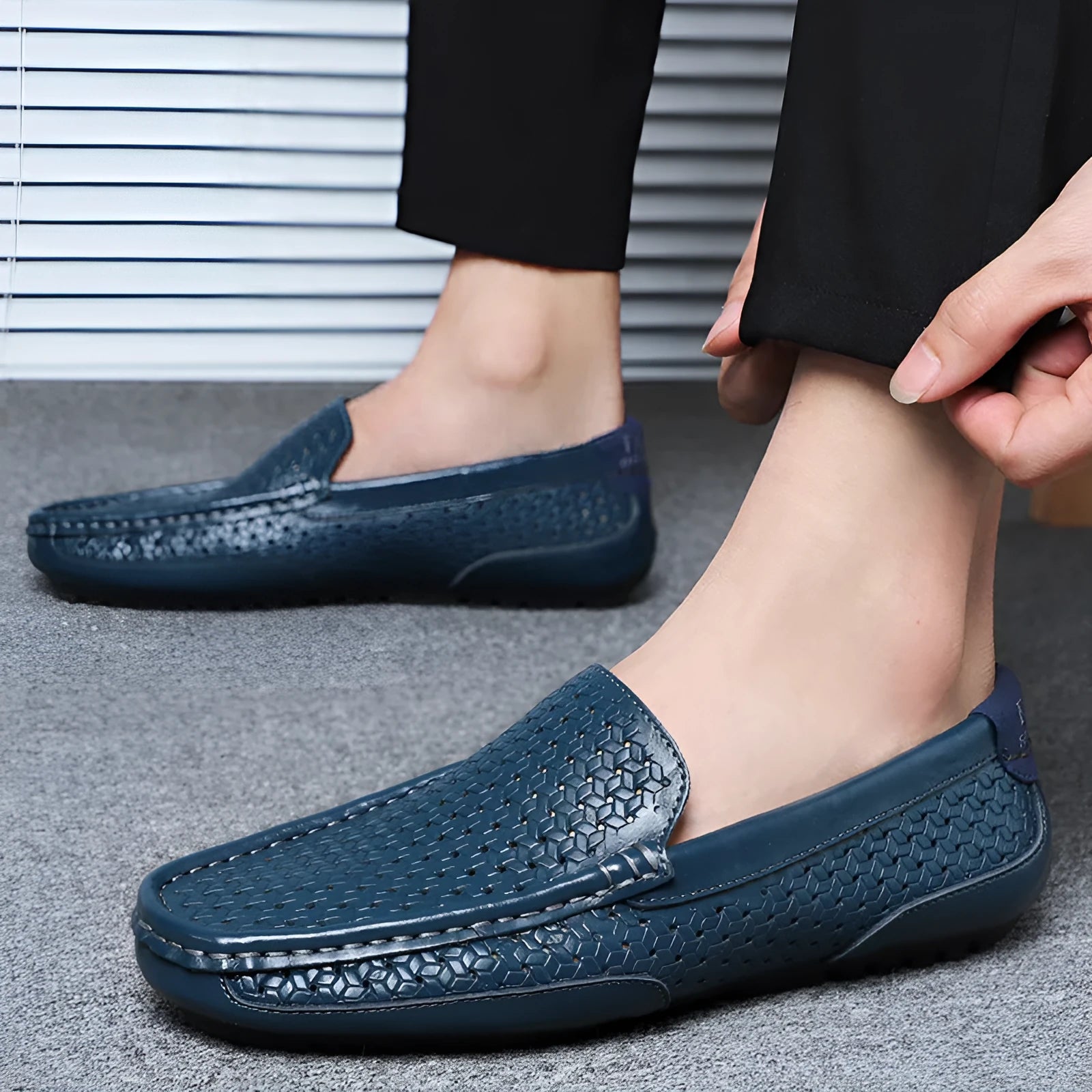 Men's summer leather shoes with breathable mesh upper in solid black colour on white background