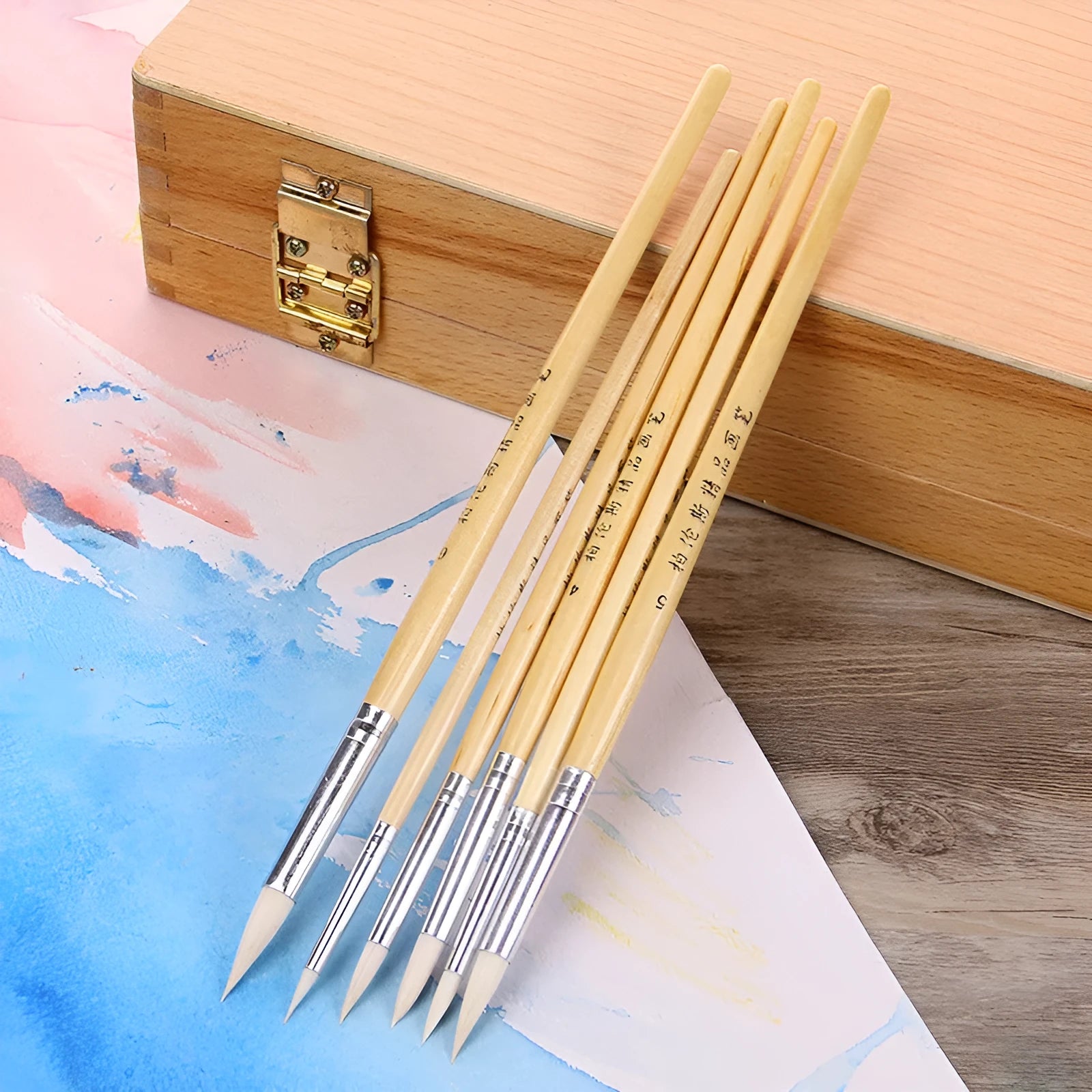 Set of six wooden-handled wool pointed hook line pen brushes for detailed art and calligraphy.