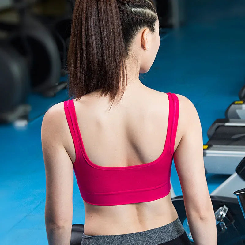 Women's reinforced sports bra showing fixed double-shoulder straps and moulded cup construction in available colours