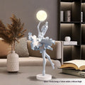 Small modern resin night lamp with USB charging cable in Black Gold colour.