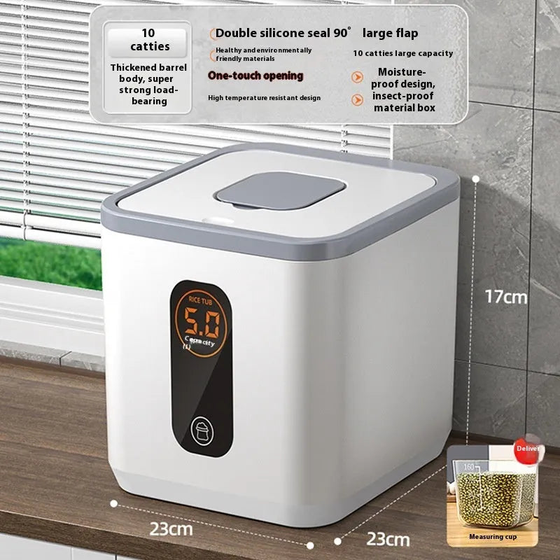 Grey plastic household rice storage jar with a sealed lid and a measuring cup.