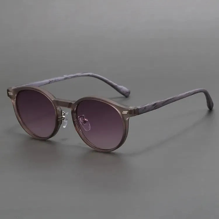 Retro frosted round rim sunglasses with UV-protection lenses in leopard print frame.