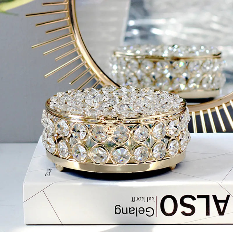 Clear crystal glass jewellery storage box with a French gold-coloured metal frame.