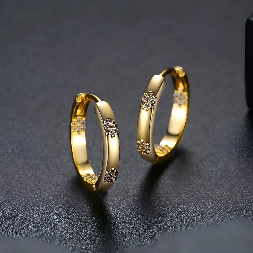 Women's geometric inlaid diamond pattern earrings in gold colour with electroplated copper construction
