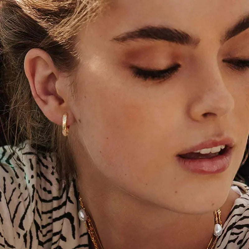 Women's geometric inlaid diamond pattern earrings in gold colour with electroplated copper construction