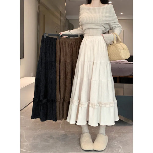 Korean style A-line corduroy skirt with elastic waistband in milky white colour.