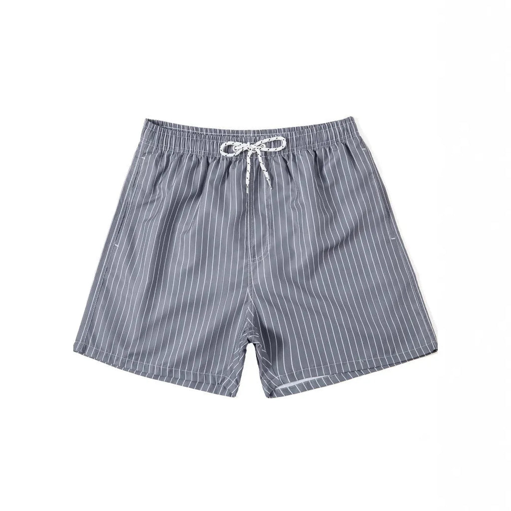 Polyester fibre beach shorts with striped triangle lining in straight leg design