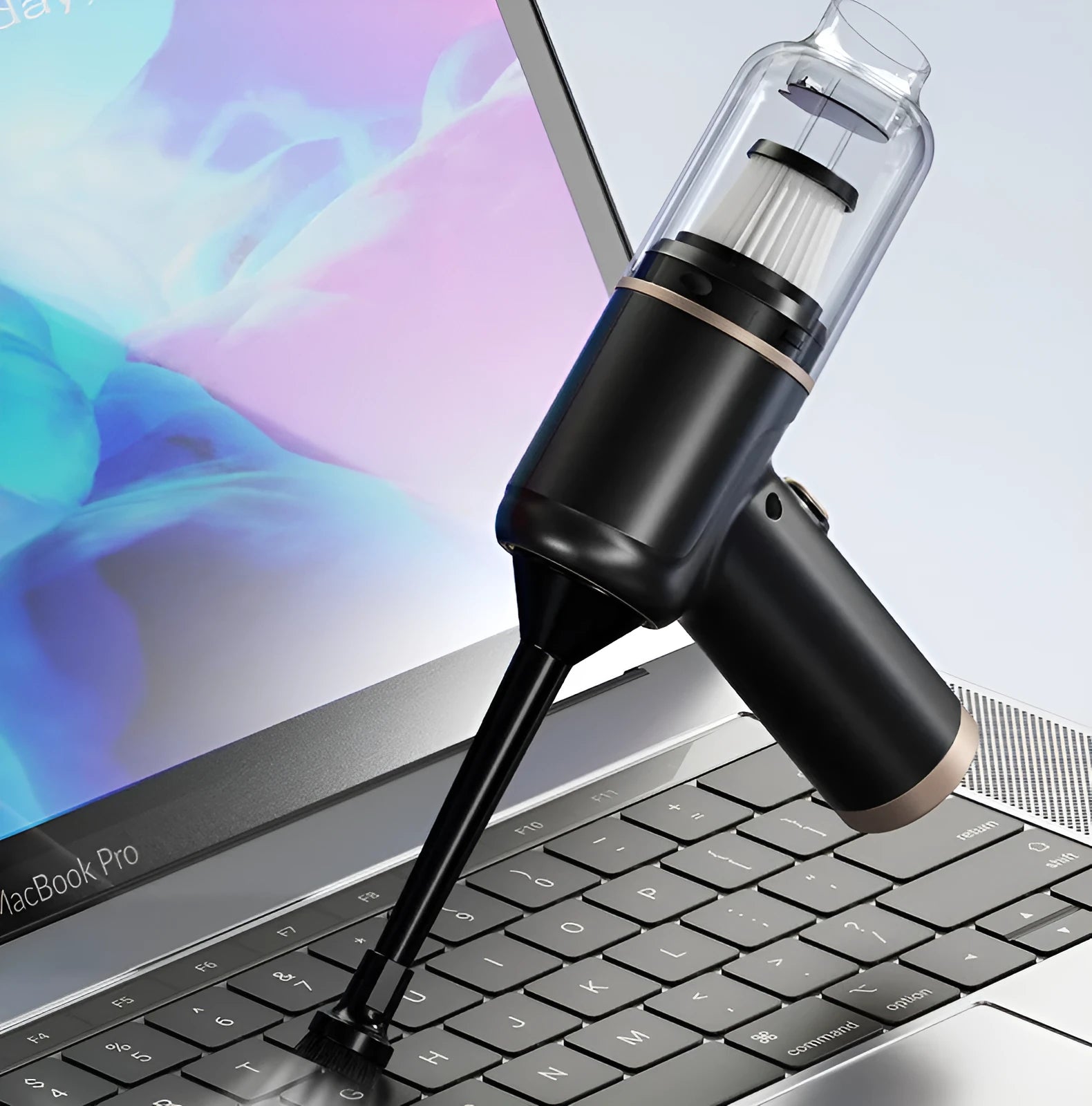 Black wireless car vacuum cleaner with multiple nozzle attachments and USB charging cable