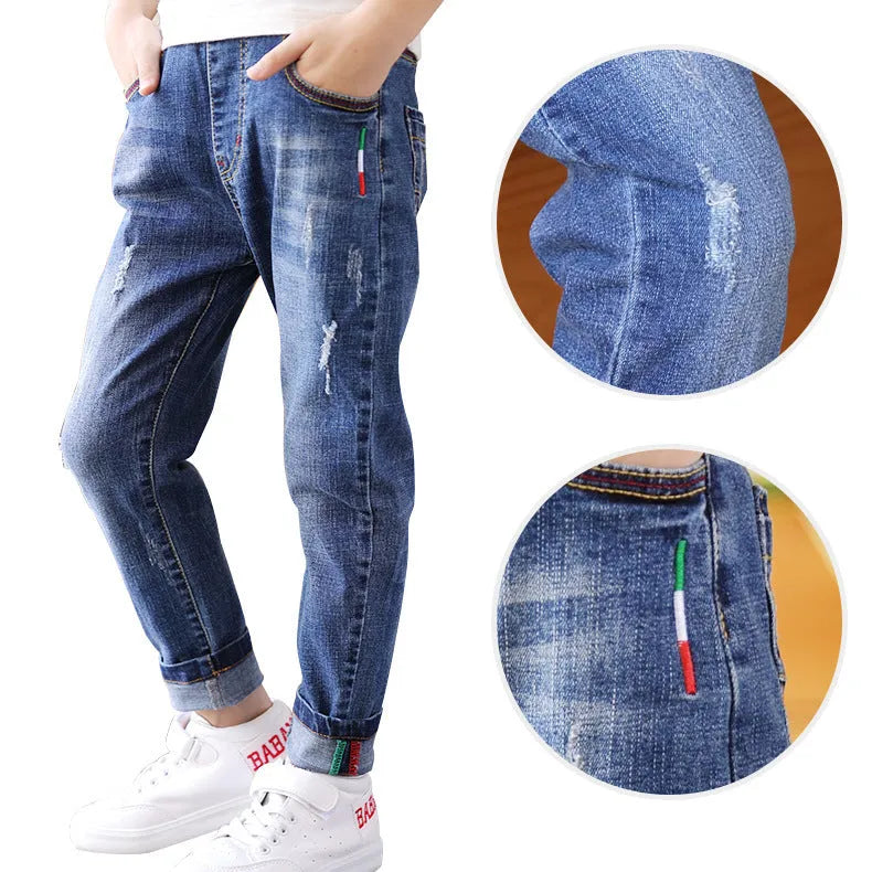 Boys' cotton denim mid-waist jeans in blue, size 140cm, front view
