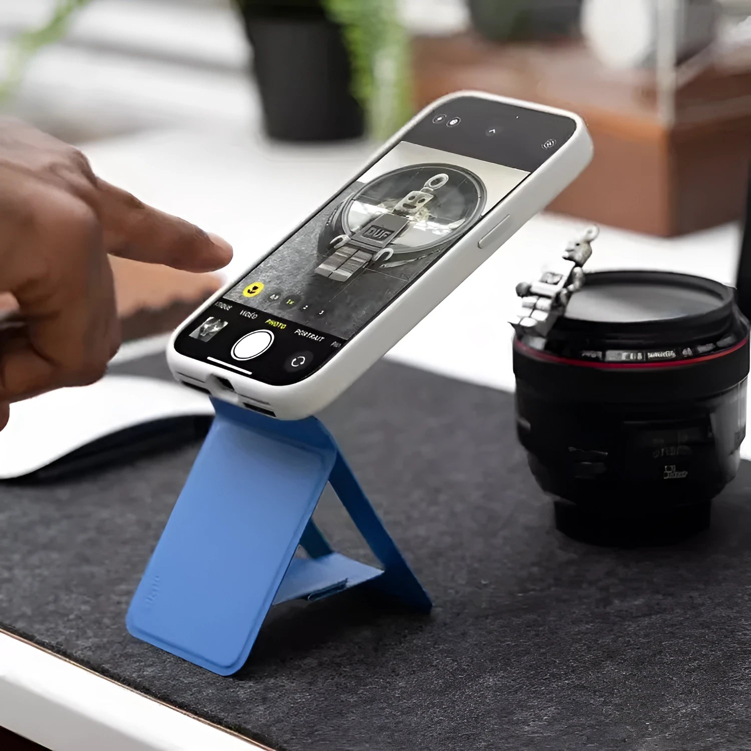 Magnetic mobile phone holder case in black, blue, green, and grey colours showing slim profile and integrated magnet.
