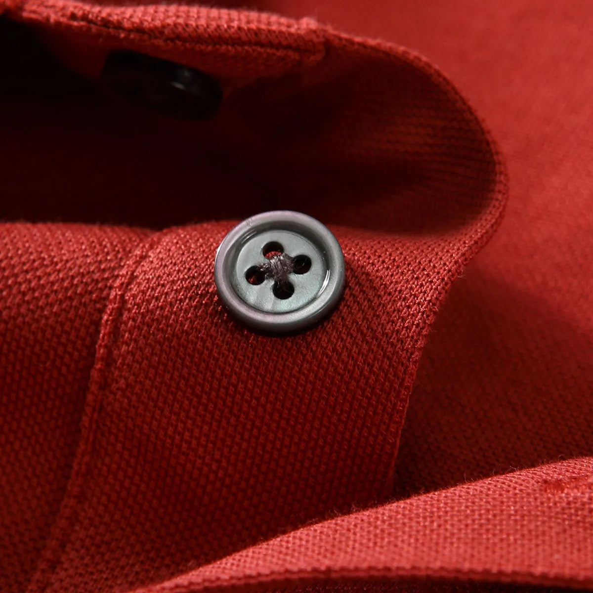 Short-sleeved lapel collar t-shirt in mulberry silk cotton blend on a hanger, showing mosaic detail.