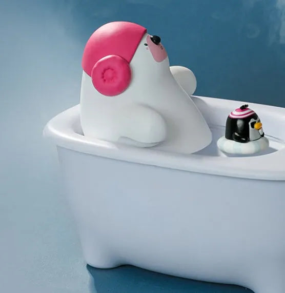 White plastic USB air humidifier with water tank on a desk