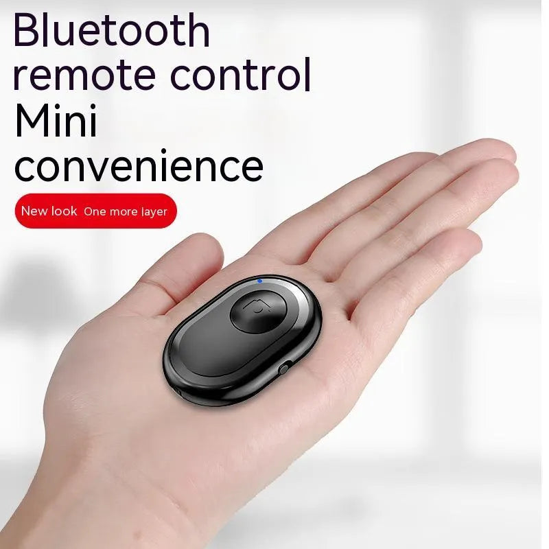 Wireless Bluetooth remote control for smartphone photography in black, pink, or purple colours